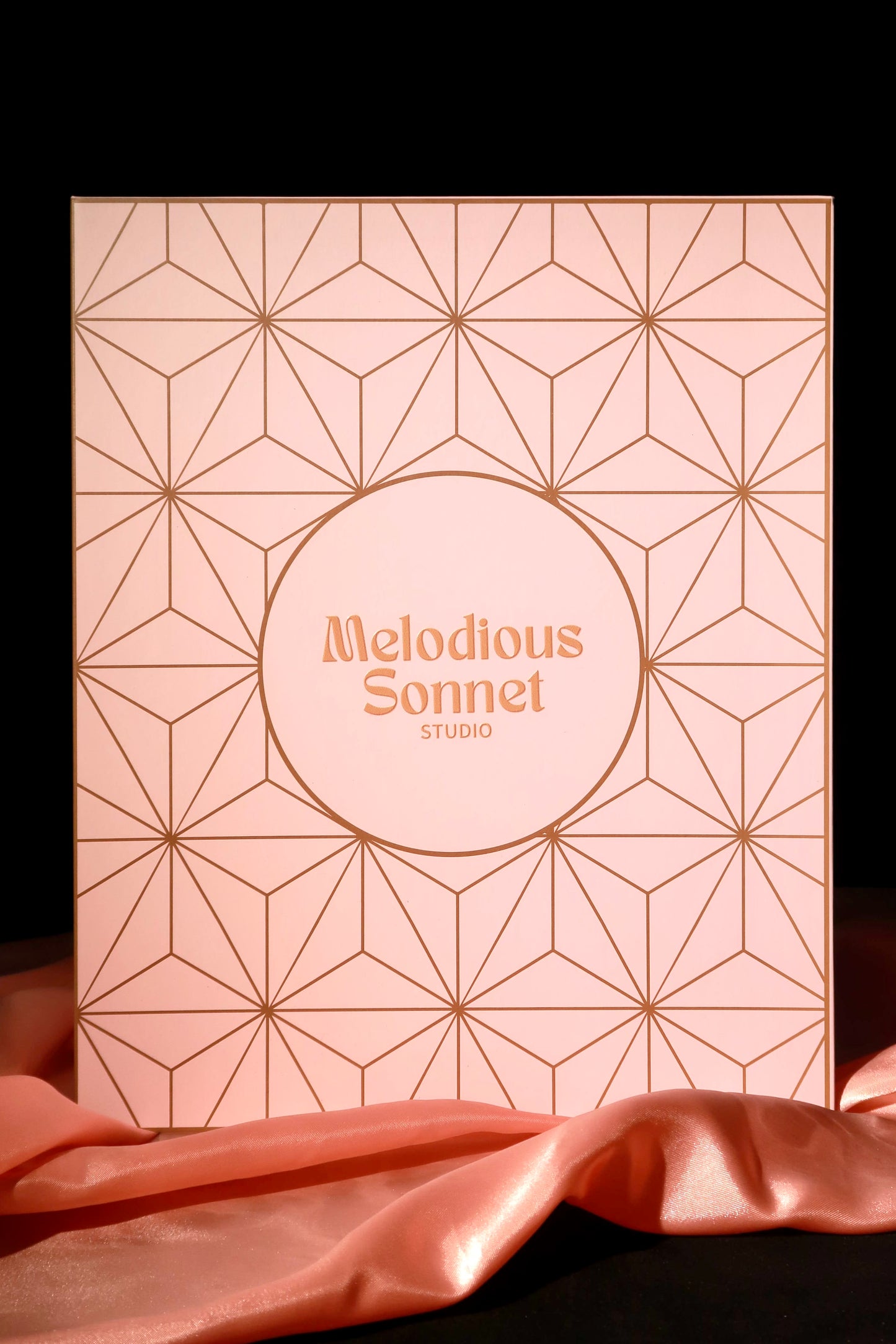 2025 advent calendar packaging with 'Melodious Sonnet Studio' branding on a dark background.