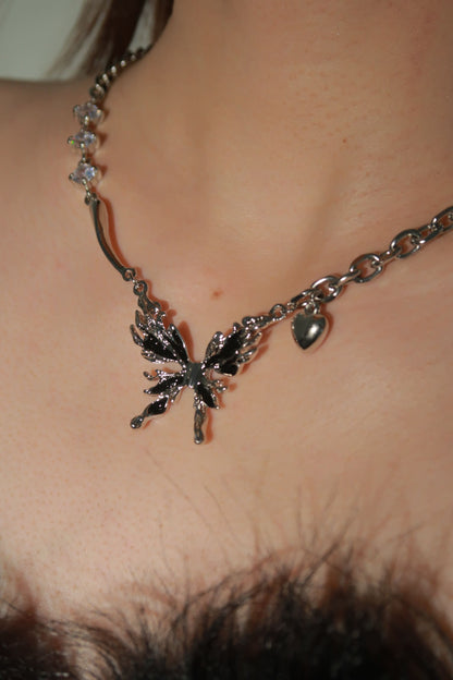 close up Butterfly Embrace Heart Necklace