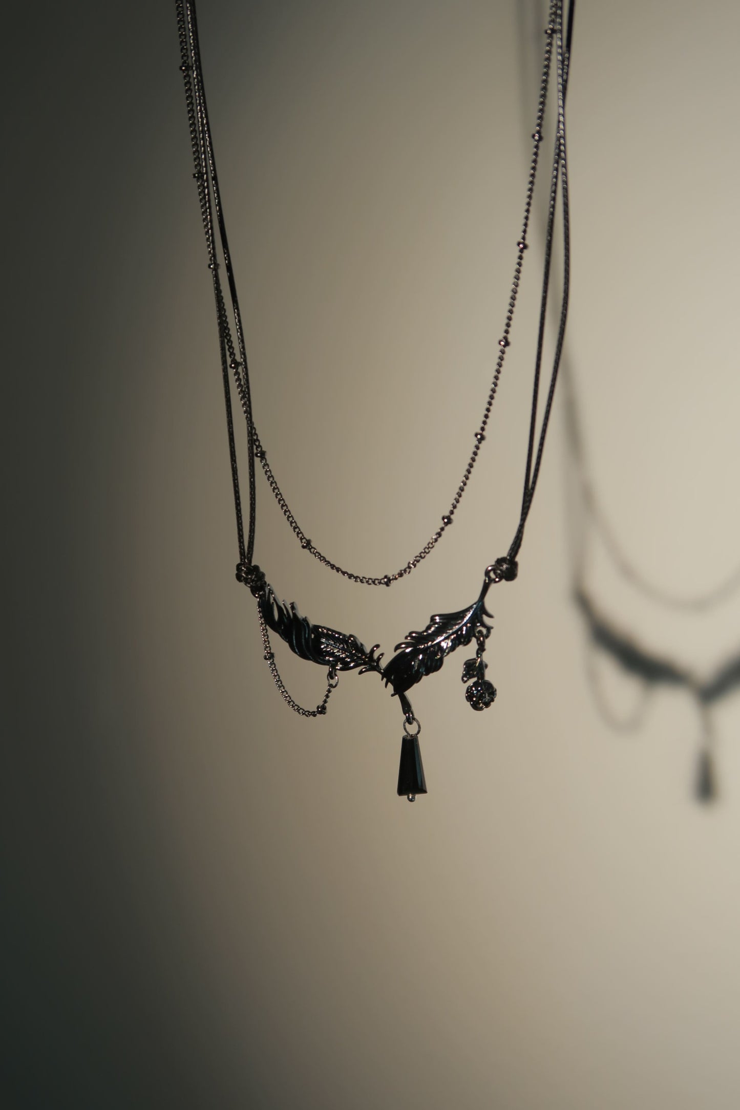 Dark Fallen Feather Necklace